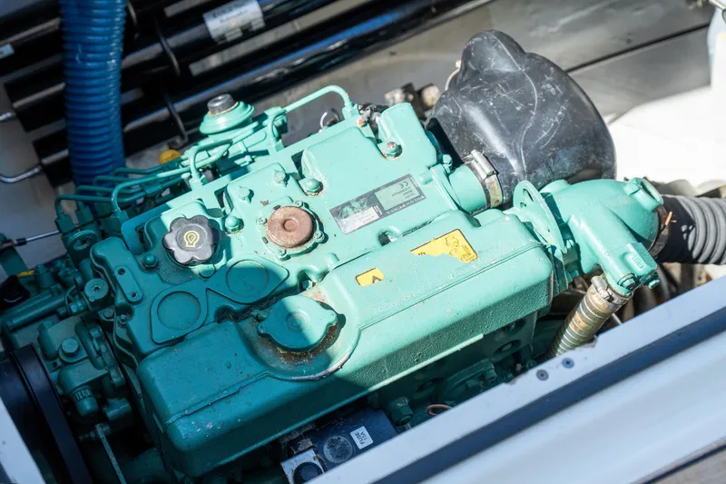 Slide: The Image of Engine of a 2014 Fountaine Pajot Helia 44 catamaran, showcasing mechanical components. - 40