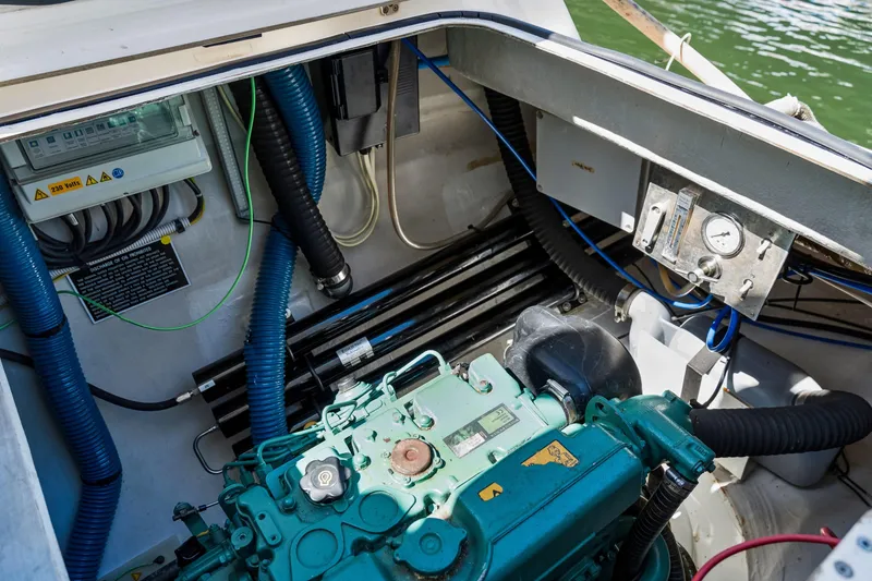 Slide: The Image of Engine compartment of 2014 Fountaine Pajot Helia 44 catamaran, showcasing mechanical components. - 45