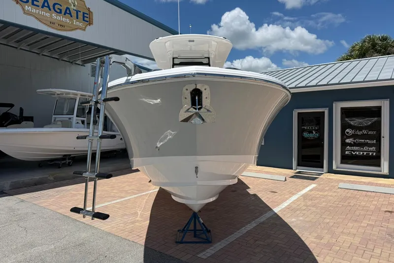 Slide: The Image of 2026 Edgewater 250CC boat displayed at Seagate Marine Sales. - 2