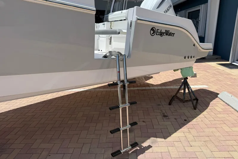 Slide: The Image of Edgewater 250CC 2026 boat with ladder, displayed on a brick surface. - 3