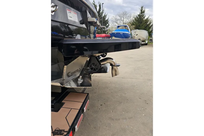 Slide: The Image of Rear view of a 2022 Supra SE 550 boat with advanced wake system. - 30