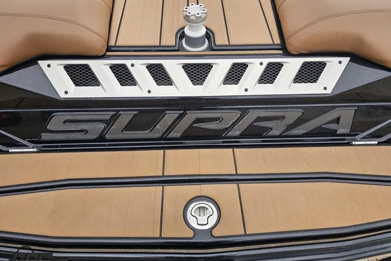 Slide: The Image of 2022 Supra SE 550 boat deck with logo and seating detail. - 40