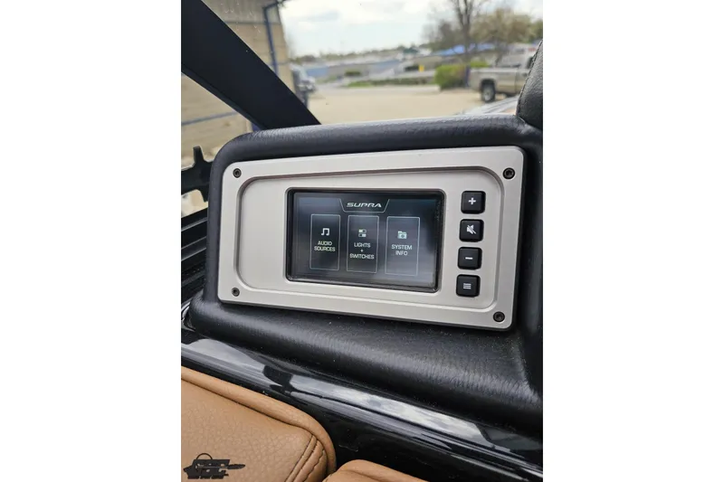Slide: The Image of 2022 Supra SE 550 dashboard display with audio and system controls. - 81