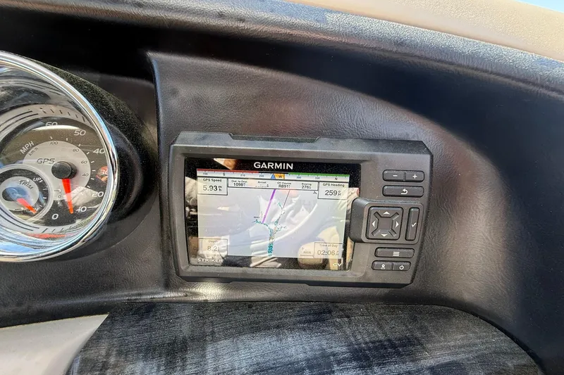 Slide: The Image of Dashboard of 2018 Avalon Catalina Funship Platinum with Garmin GPS and speedometer. - 31