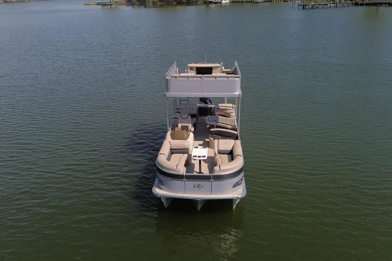 Slide: The Image of 2018 Avalon Catalina Funship Platinum pontoon boat on calm water. - 6