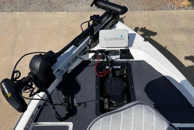 Slide: The Image of 1999 Skeeter SX170 boat with Garmin navigation and Minn Kota trolling motor. - 12