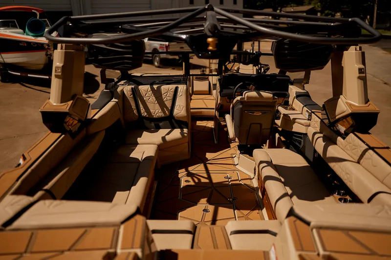 Slide: The Image of 2025 Nautique Super Air Nautique G25 Paragon interior with luxurious seating and advanced features. - 11