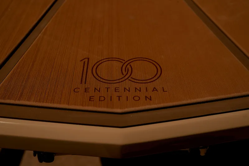 Slide: The Image of 2025 Nautique Super Air Nautique G25 Paragon Centennial Edition logo on wooden surface. - 19