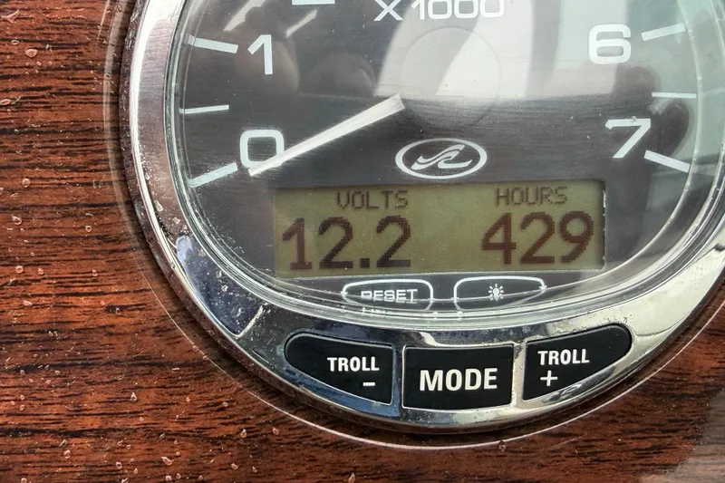 Slide: The Image of Close-up of 2009 Sea Ray 210 Sundeck gauge showing 12.2 volts and 429 hours. - 22