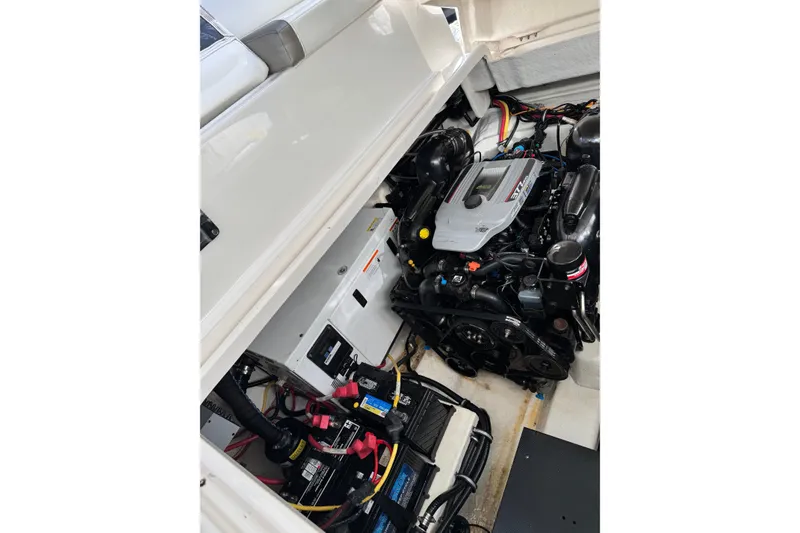 Slide: The Image of Engine compartment of a 2013 Monterey 340 Sport Yacht, showcasing detailed mechanical components. - 16