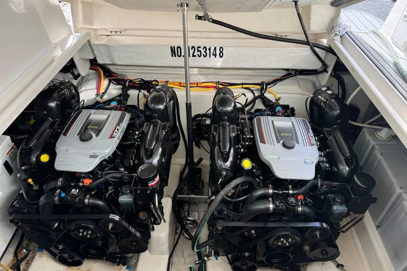 Slide: The Image of Twin engines in a 2013 Monterey 340 Sport Yacht engine compartment. - 21