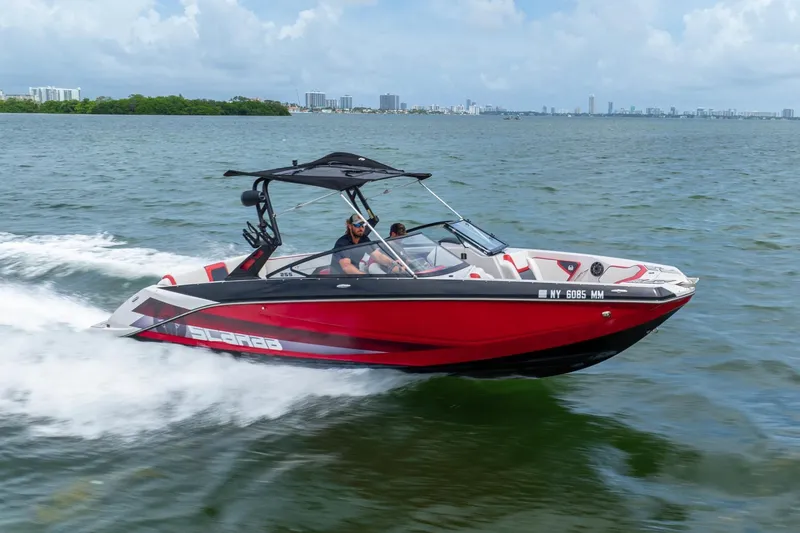 The Image of 2017 Scarab 255 H.O. Impulse speedboat cruising on open water. - 1