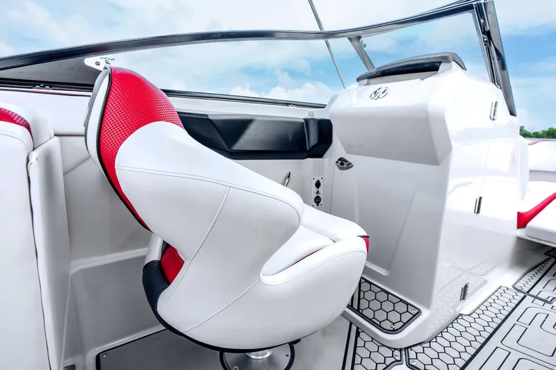 Slide: The Image of 2017 Scarab 255 H.O. Impulse boat interior with white and red seating, modern dashboard. - 11