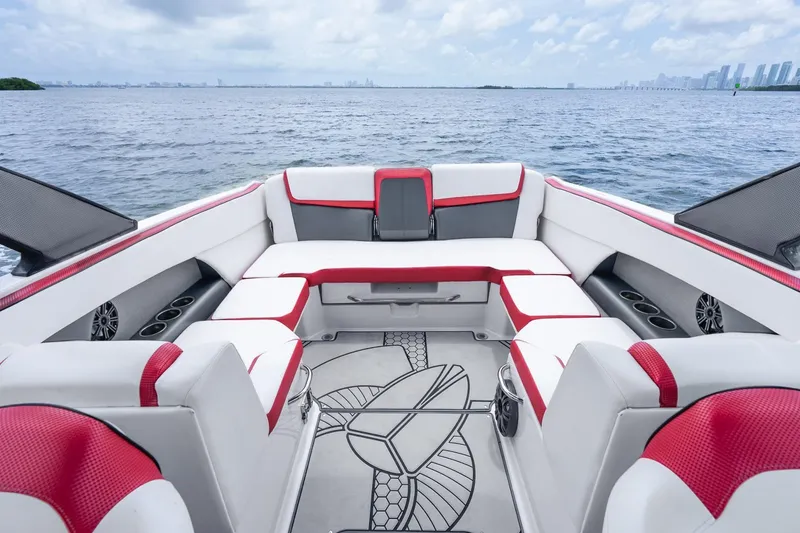 Slide: The Image of 2017 Scarab 255 H.O. Impulse boat interior with red and white seating, ocean view. - 19
