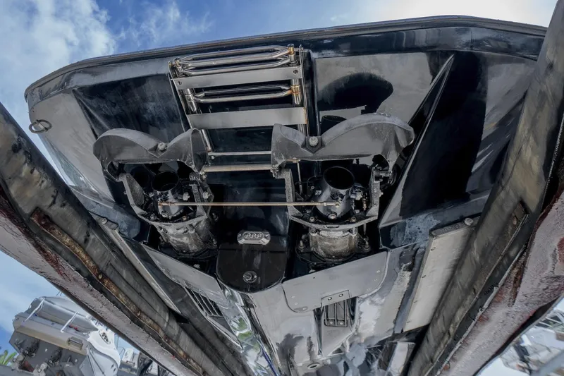 Slide: The Image of Underneath view of a 2017 Scarab 255 H.O. Impulse boat, showcasing dual jet drives. - 27