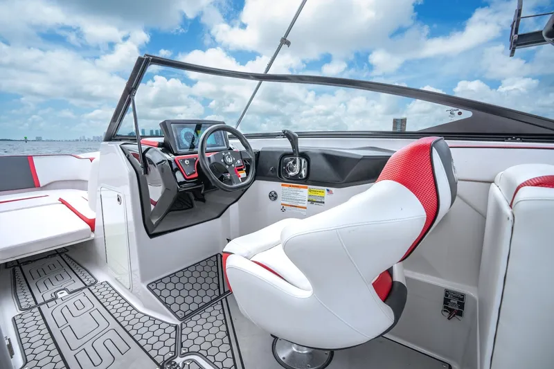 Slide: The Image of 2017 Scarab 255 H.O. Impulse boat interior with modern dashboard and seating. - 8