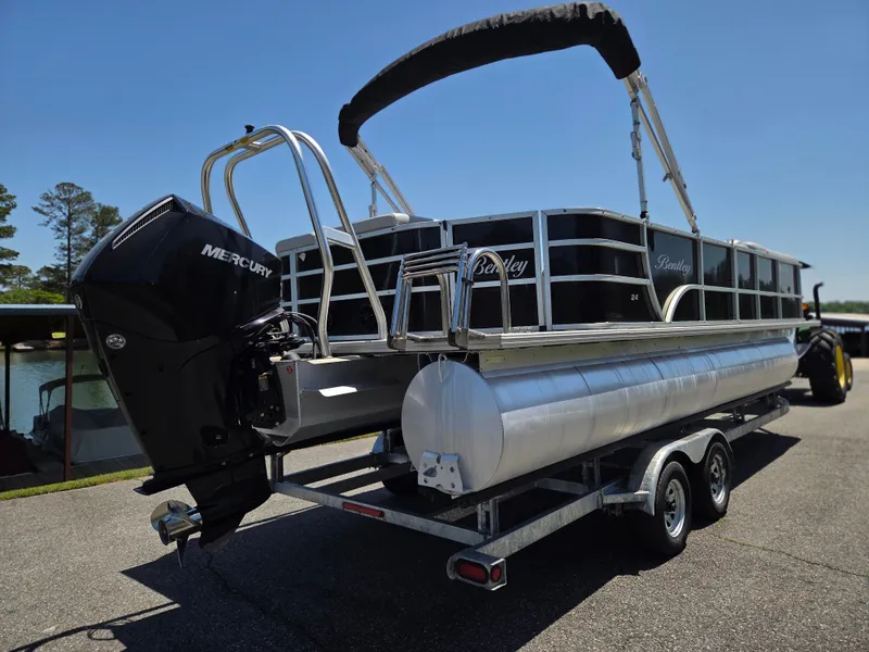 Slide: The Image of 2022 Bentley Pontoons 243 Cruise on trailer with Mercury engine. - 2