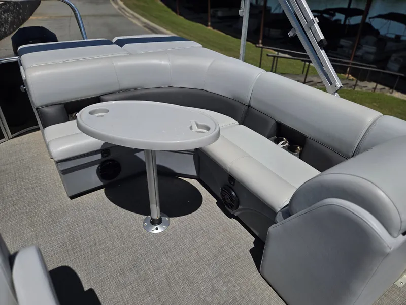 Slide: The Image of Interior of a 2022 Bentley Pontoons 243 Cruise with gray seating. - 3