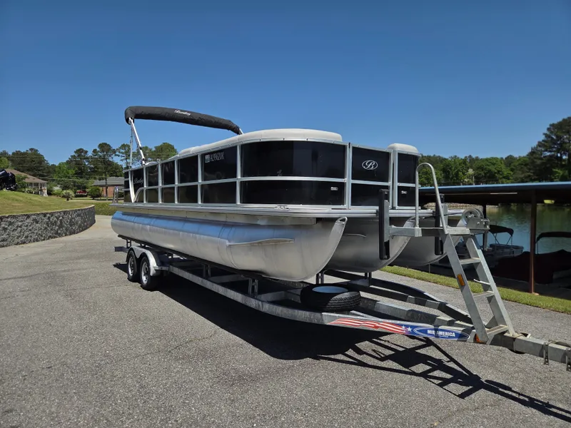 Slide: The Image of 2022 Bentley Pontoons 243 Cruise on trailer, sunny day. - 4