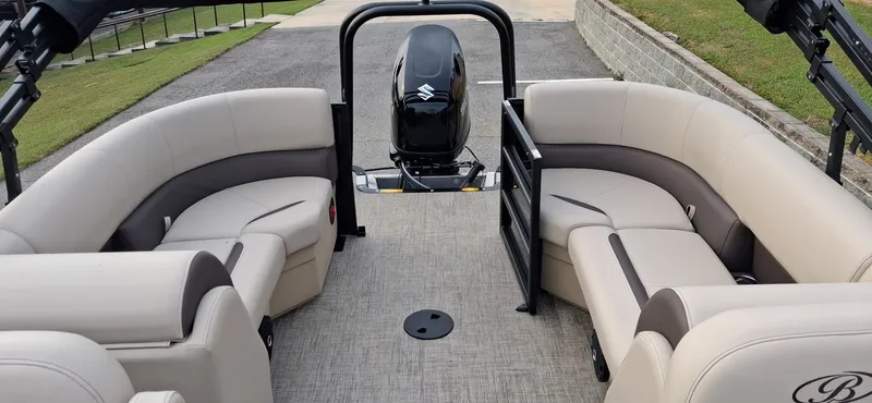 Slide: The Image of Interior of 2026 Bentley Pontoons Legacy 220 Navigator with luxurious seating. - 2