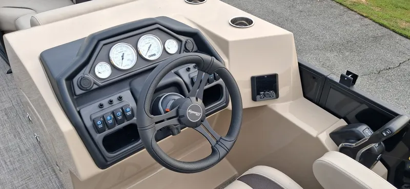 Slide: The Image of Dashboard of the 2026 Bentley Pontoons Legacy 220 Navigator. - 6