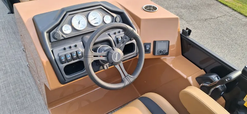 Slide: The Image of Interior view of 2026 Bentley Pontoons Legacy 240 Navigator helm. - 4