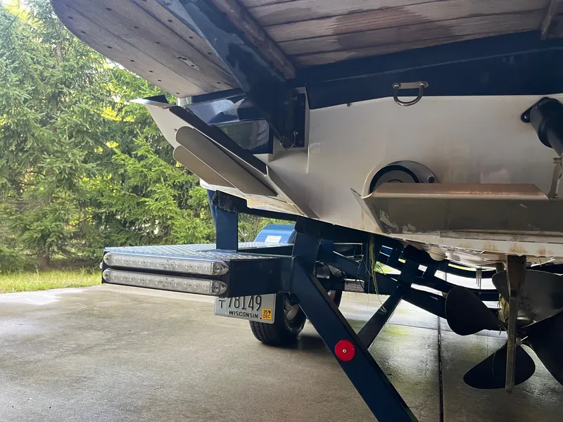 Slide: The Image of Rear view of a 2015 MasterCraft X20 boat on a trailer. - 14