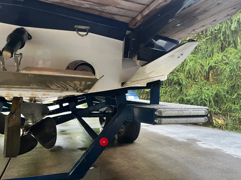 Slide: The Image of Rear view of a 2015 MasterCraft X20 boat on a trailer. - 15