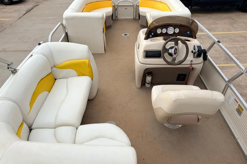 Slide: The Image of 2008 Sun Tracker Party Barge 21 Signature Series interior with white and yellow seating. - 10