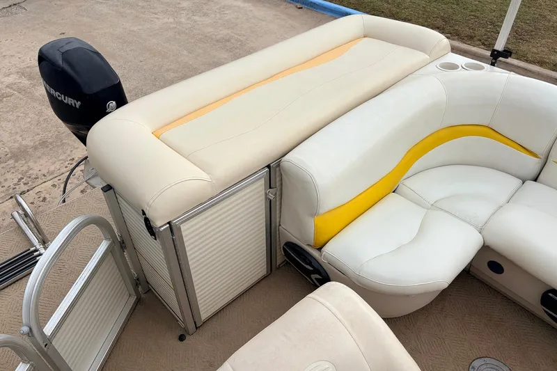 Slide: The Image of 2008 Sun Tracker Party Barge 21 Signature Series with comfortable seating and Mercury outboard motor. - 16