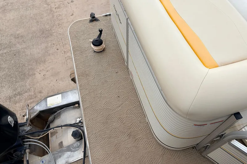 Slide: The Image of 2008 Sun Tracker Party Barge 21 Signature Series, featuring deck and seating area. - 17