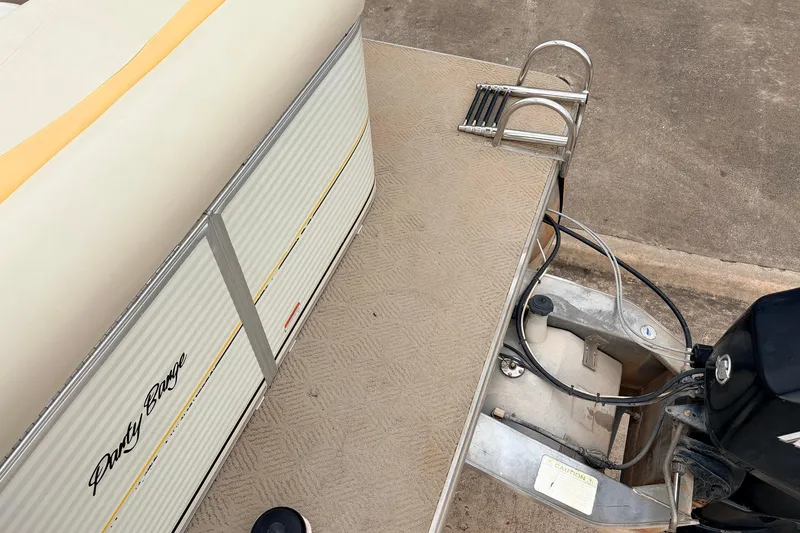 Slide: The Image of 2008 Sun Tracker Party Barge 21 Signature Series pontoon boat with motor and deck view. - 18