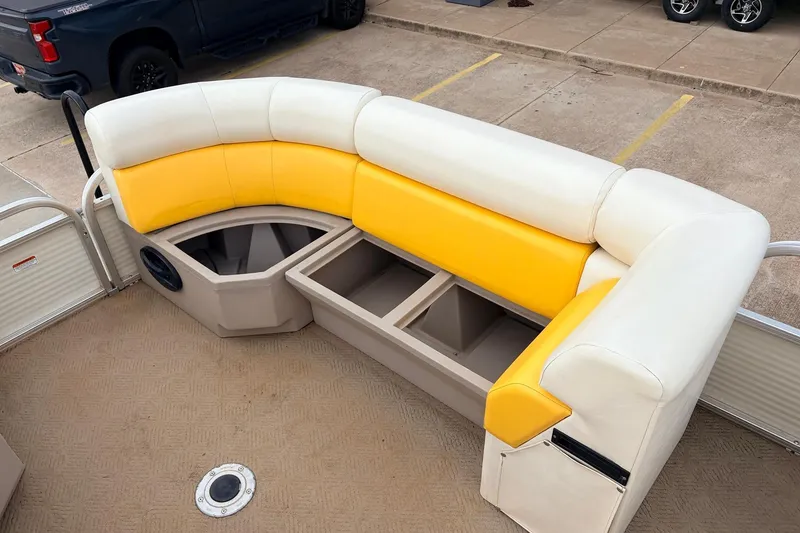 Slide: The Image of 2008 Sun Tracker Party Barge 21 Signature Series seating with yellow and white upholstery. - 19