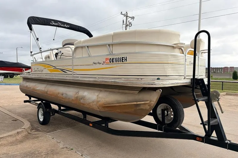Slide: The Image of 2008 Sun Tracker Party Barge 21 Signature Series pontoon boat on trailer. - 4