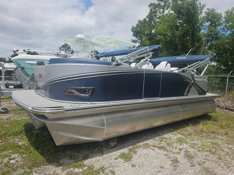 The Image of 2026 Avalon LSZ 2185 Quad Lounger pontoon boat outdoors. - 0
