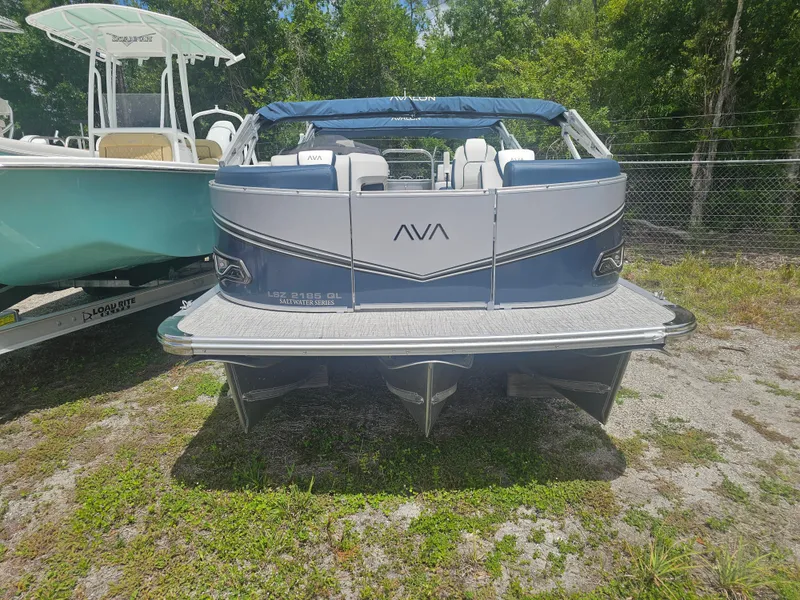 Slide: The Image of 2026 Avalon LSZ 2185 Quad Lounger pontoon boat outdoors. - 15