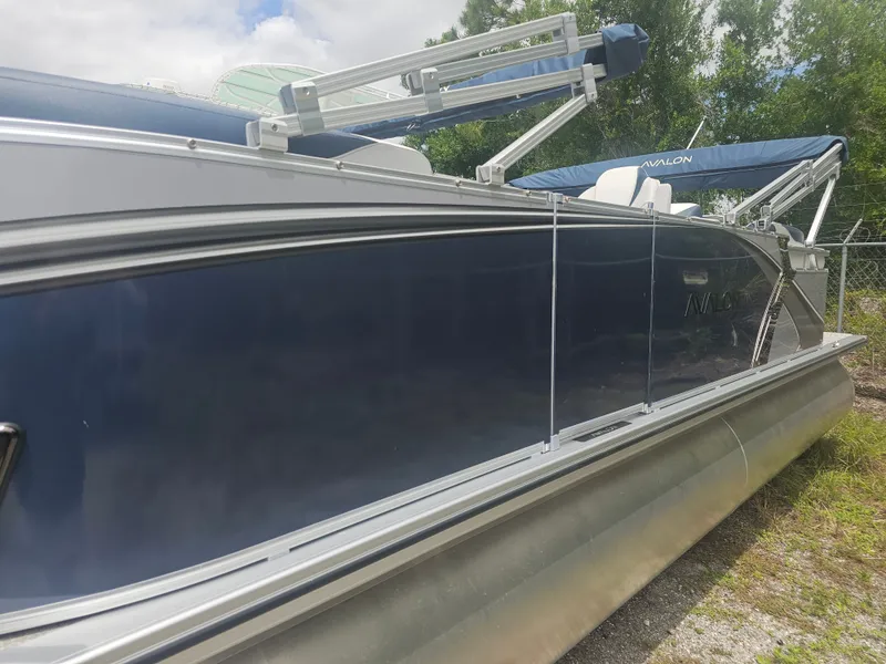 Slide: The Image of 2026 Avalon LSZ 2185 Quad Lounger pontoon boat side view. - 17