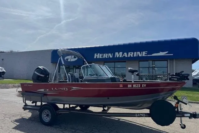 The Image of 2011 Lund 1875 Impact SS boat on trailer outside Hern Marine dealership. - 0