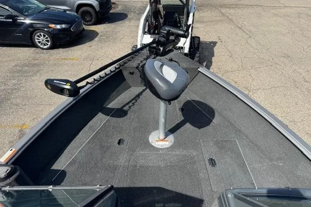 Slide: The Image of 2011 Lund 1875 Impact SS boat deck with trolling motor and seat. - 15