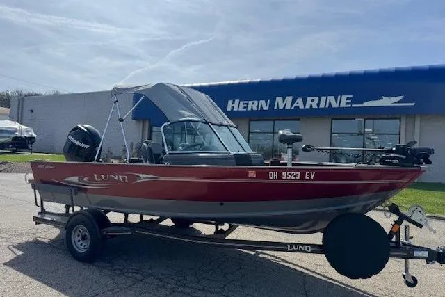 Slide: The Image of 2011 Lund 1875 Impact SS boat on trailer at Hern Marine dealership. - 2