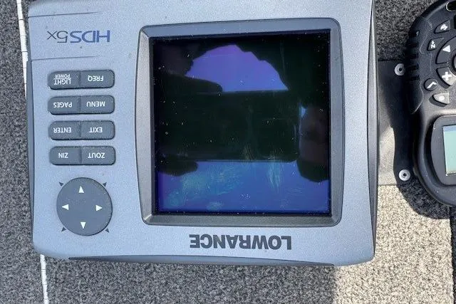 Slide: The Image of Lowrance HDS-5X fishfinder on a 2011 Lund 1875 Impact SS boat dashboard. - 22