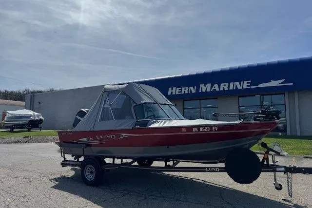 Slide: The Image of 2011 Lund 1875 Impact SS boat on trailer outside Hern Marine dealership. - 3