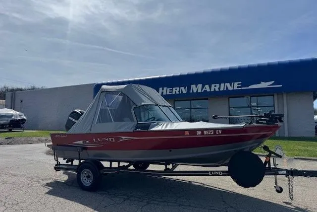 Slide: The Image of 2011 Lund 1875 Impact SS boat on trailer outside Hern Marine dealership. - 4