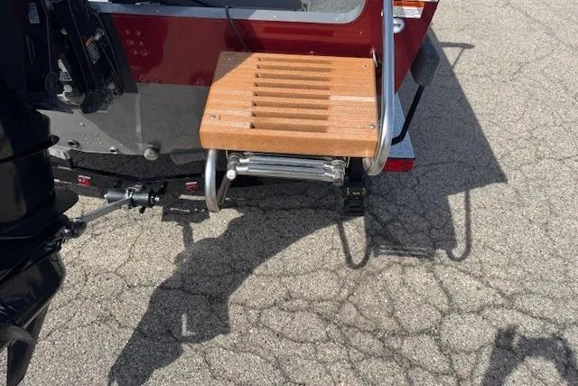 Slide: The Image of 2011 Lund 1875 Impact SS boat with wooden swim platform and ladder. - 8