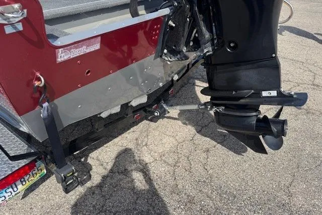 Slide: The Image of Rear view of a 2011 Lund 1875 Impact SS boat with outboard motor. - 9