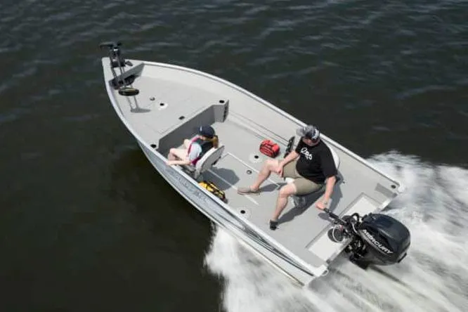 Slide: The Image of Manufacturer Provided Image: 2026 Smoker Craft Angler 16 SC boat cruising on water with two passengers. - 21