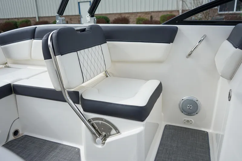 Slide: The Image of Interior seating of a 2020 Bayliner DX 2200 boat, featuring modern upholstery. - 14