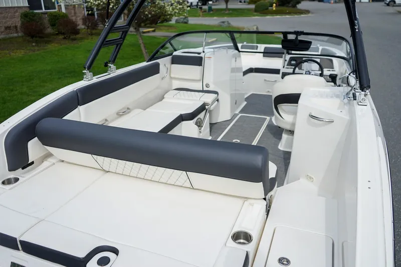 Slide: The Image of 2020 Bayliner DX 2200 boat interior with spacious seating and modern design. - 6