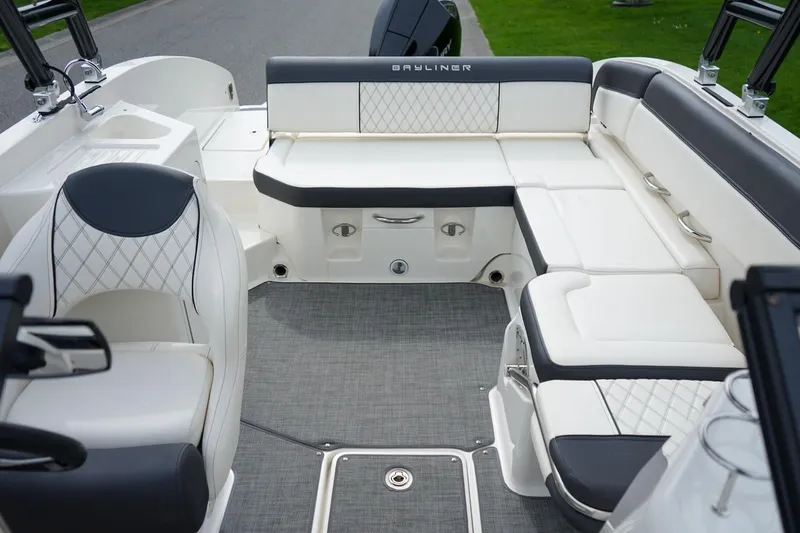 Slide: The Image of Luxurious interior of 2020 Bayliner DX 2200 boat with plush seating and modern design. - 7