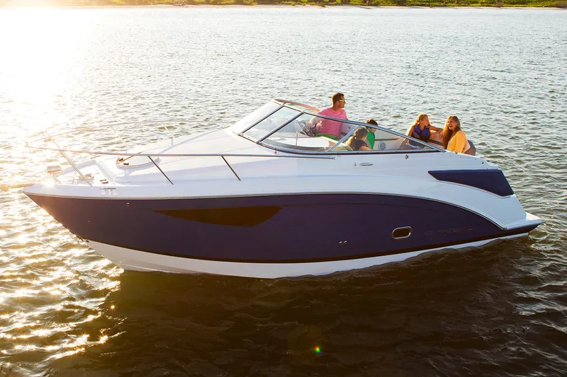Slide: The Image of Manufacturer Provided Image: 2025 Regal 26 Express boat cruising on a sunny day with passengers onboard. - 3
